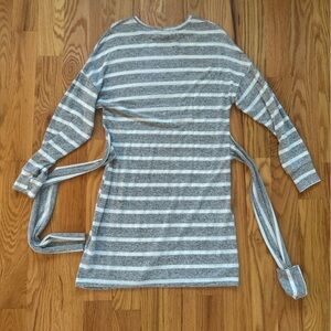 Gray and white striped long sleeve sweater dress.